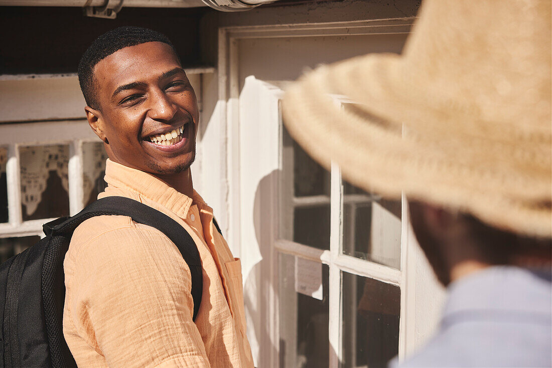 Smiling man looking away