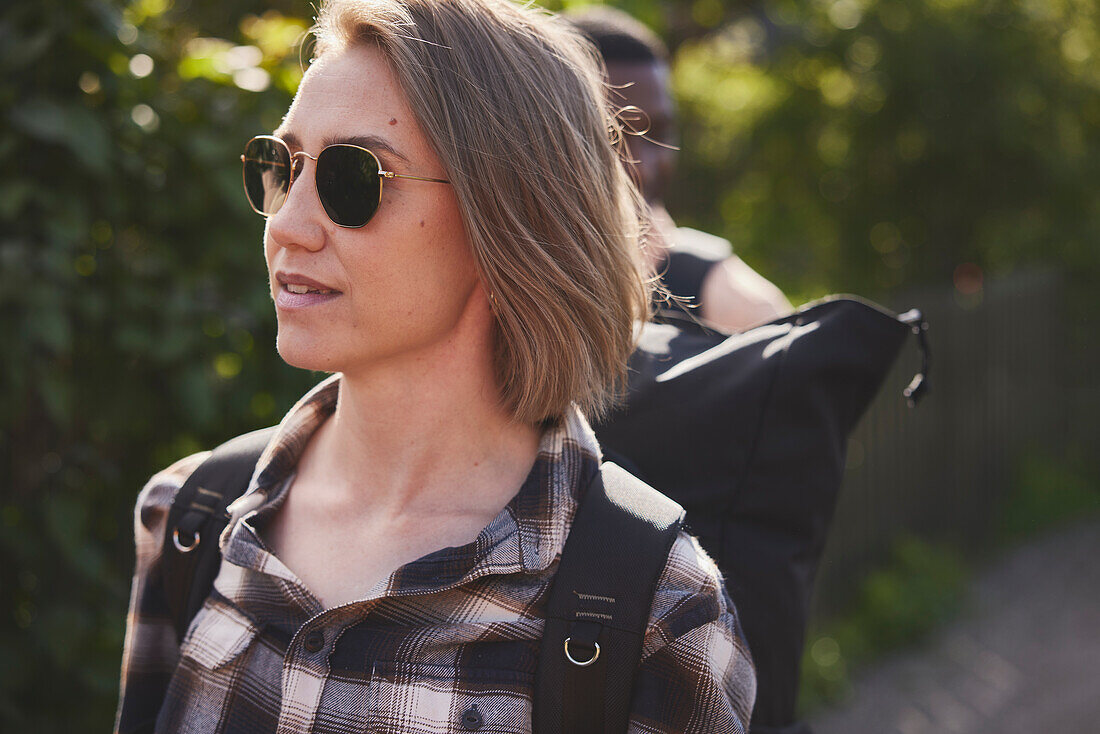 Smiling young woman looking away