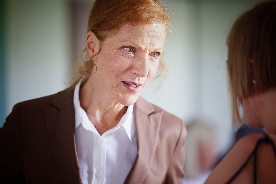 Mature businesswoman looking away