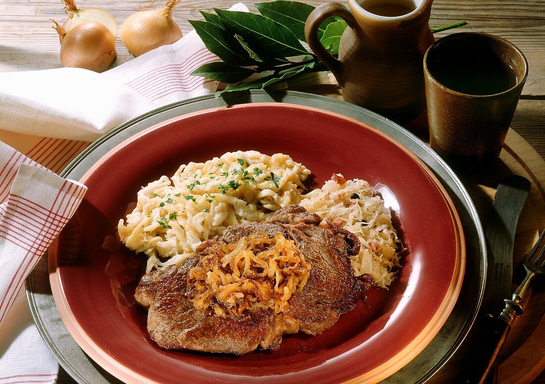 Swabian beef with onions, home-made noodles & sauerkraut