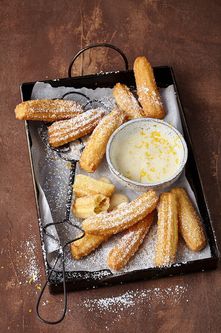 Churros with spicy cinnamon orange dipping sauce