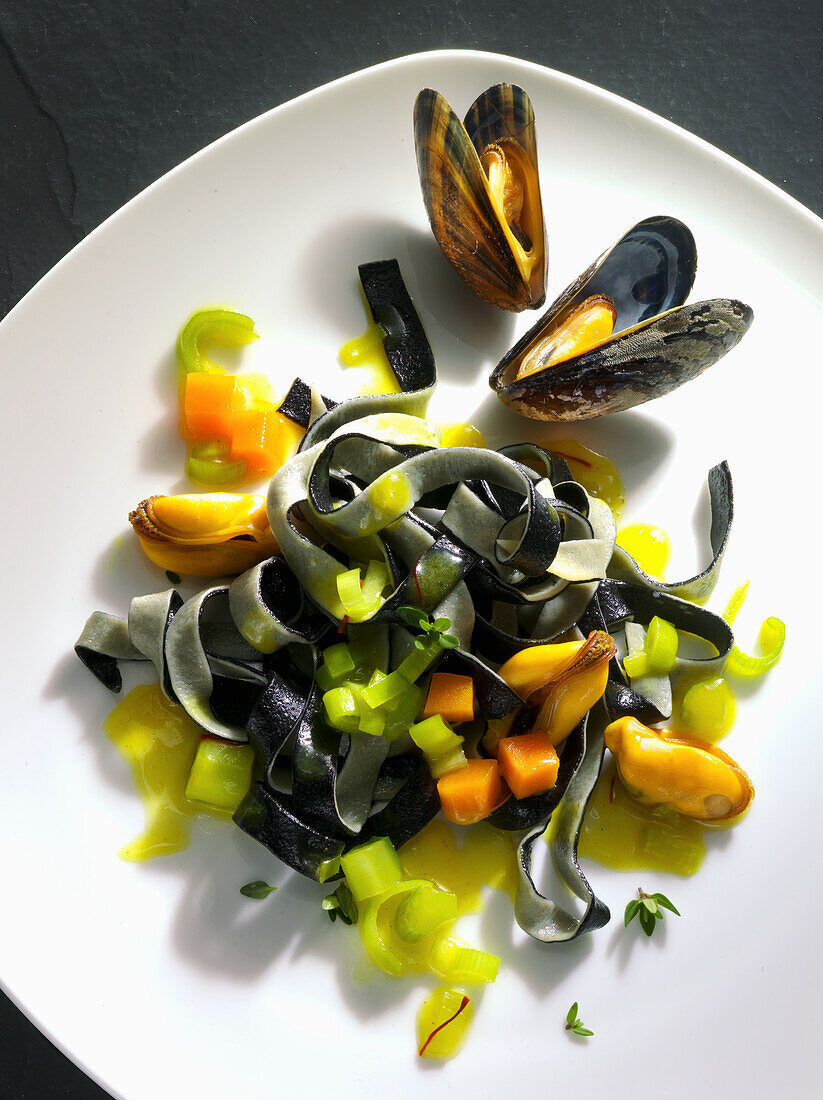 Black and white tagliatelle with mussel sauce