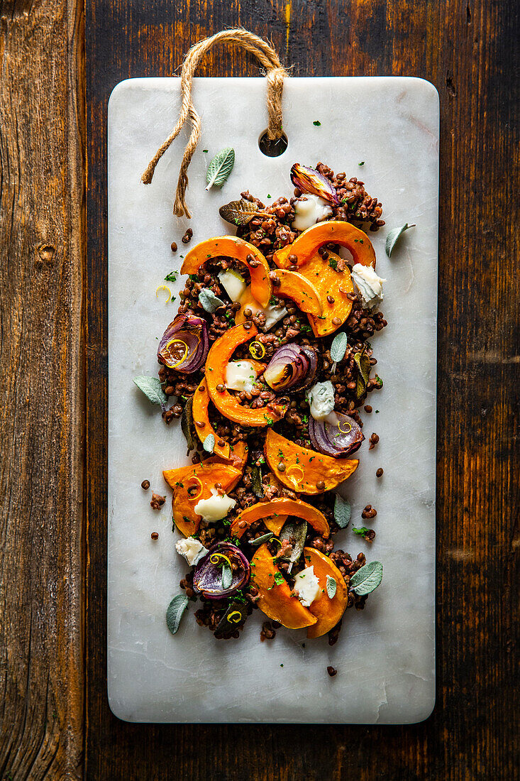 Roasted butternut squash with lentils and gorgonzola cheese