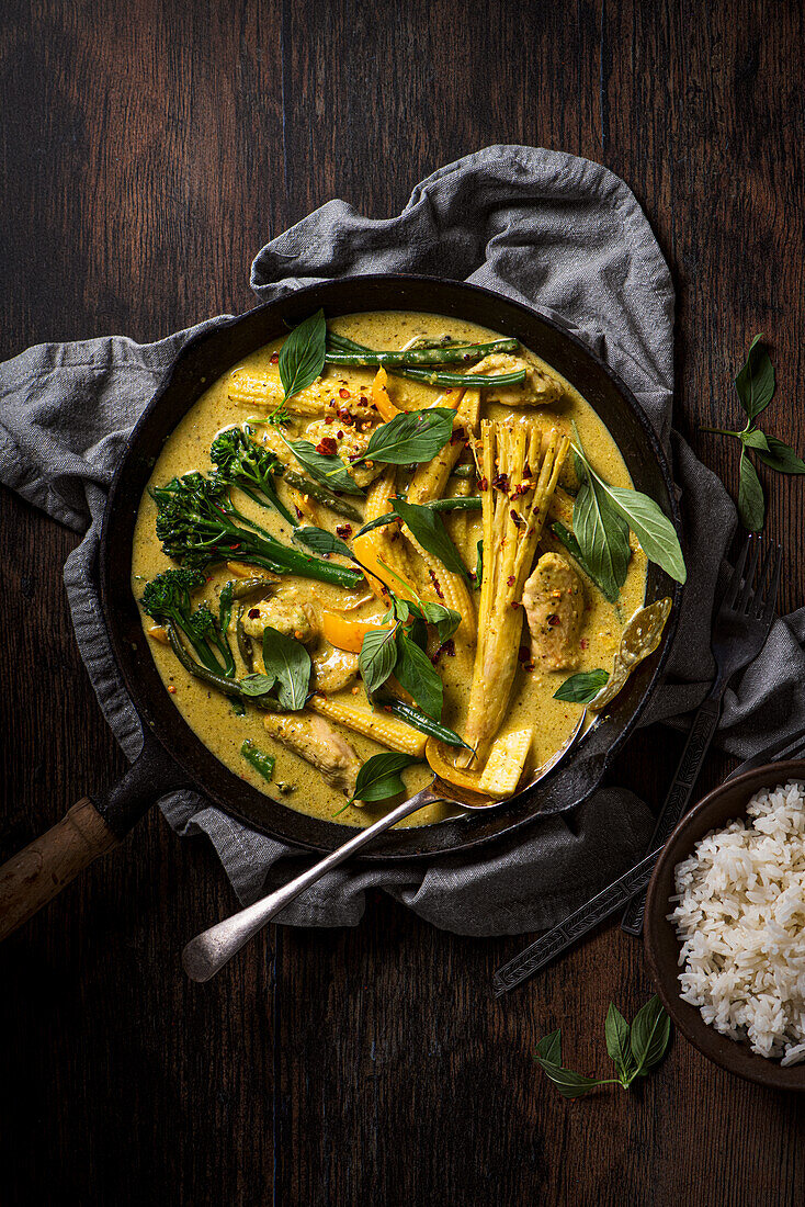 Thai chicken coconut curry with lemon grass, thai basil, lime leaves and vegetables