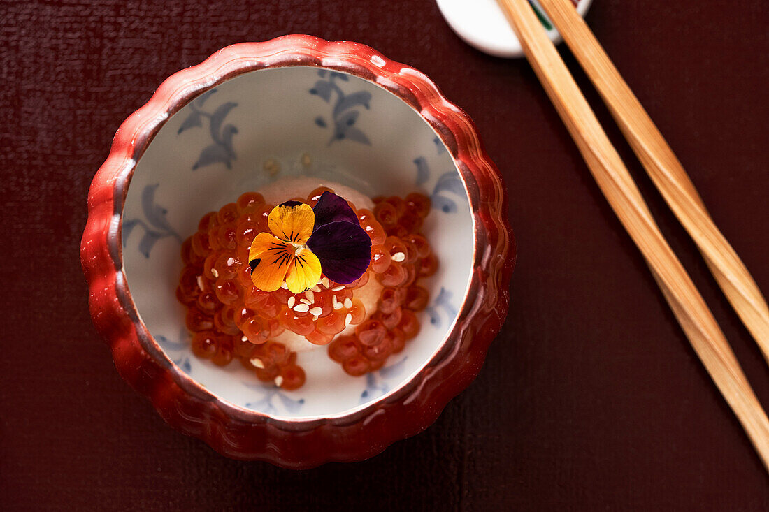 Salmon caviar on radish (Japanese cuisine)