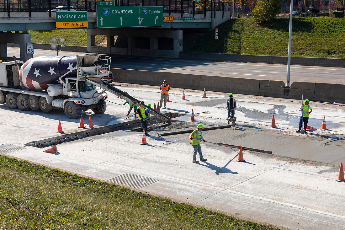 Workers repairing a highway, Michigan, USA