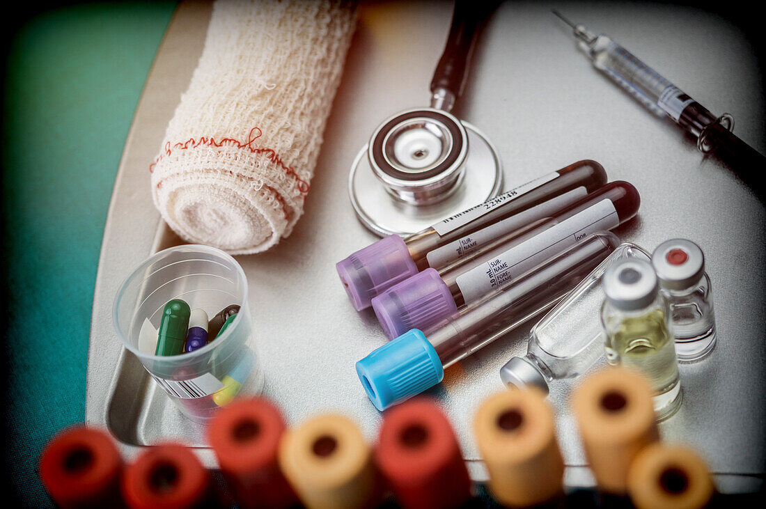 Medication and blood samples, conceptual image