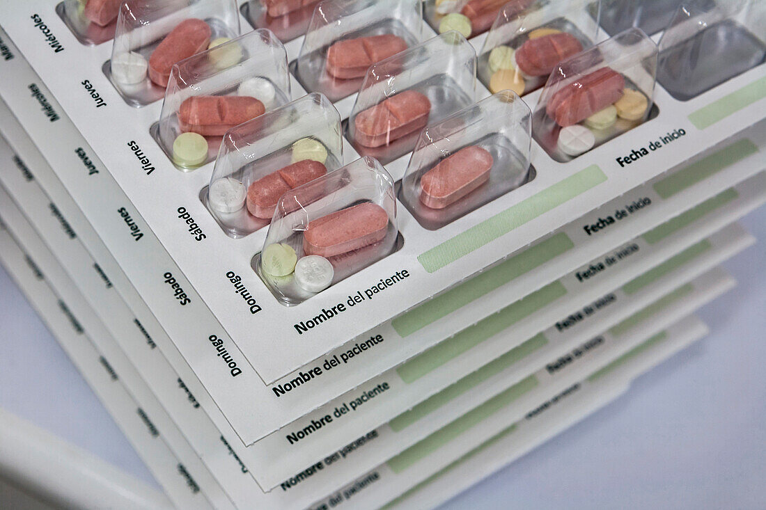 Pills with pill organizer, conceptual image