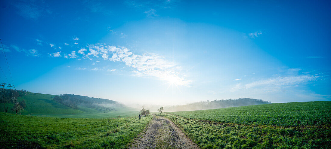 Sunrise over rural landscape