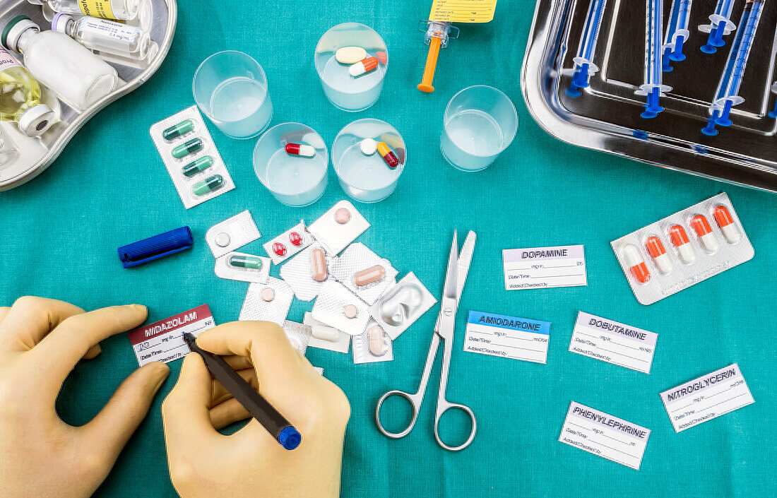 Nurse preparing hospital medication, conceptual image