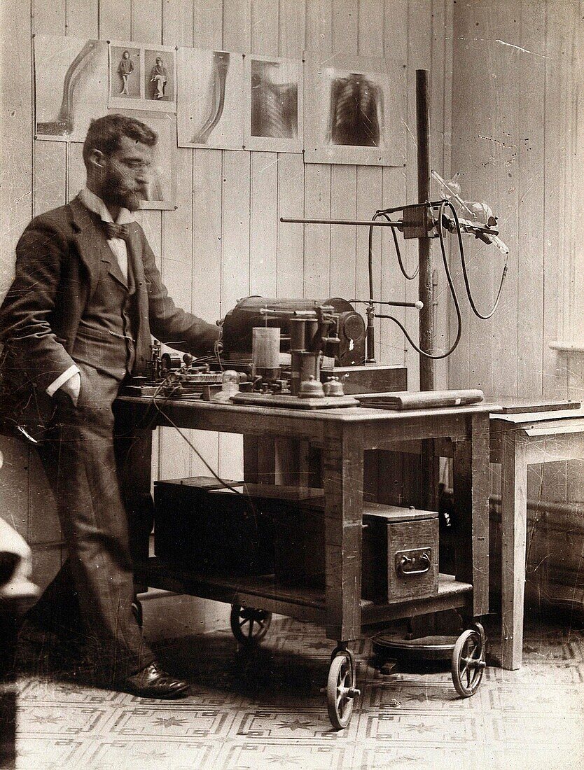 Hospital X-ray equipment and technician, 1900