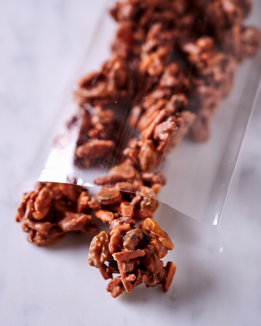 Chocolate candy crispies in a clear bag