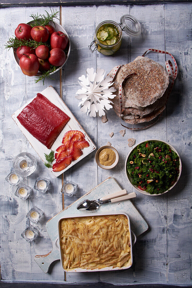 Bread, kale salad, potato and anchovy casserole and marinated salmon for Christmas