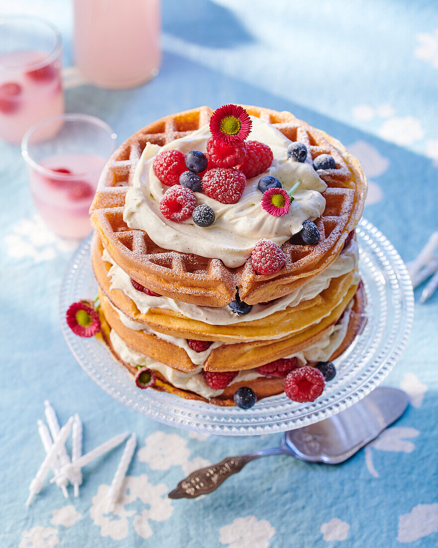 Waffle cake with cream filling and summer berries