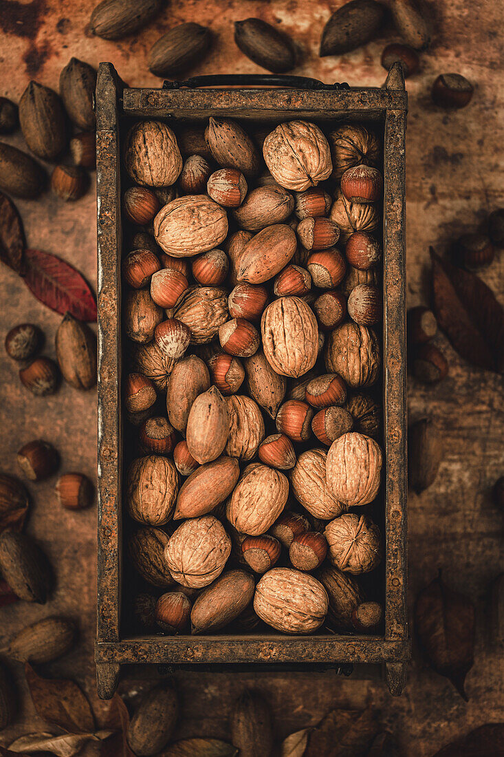 Assorted nuts in wooden box