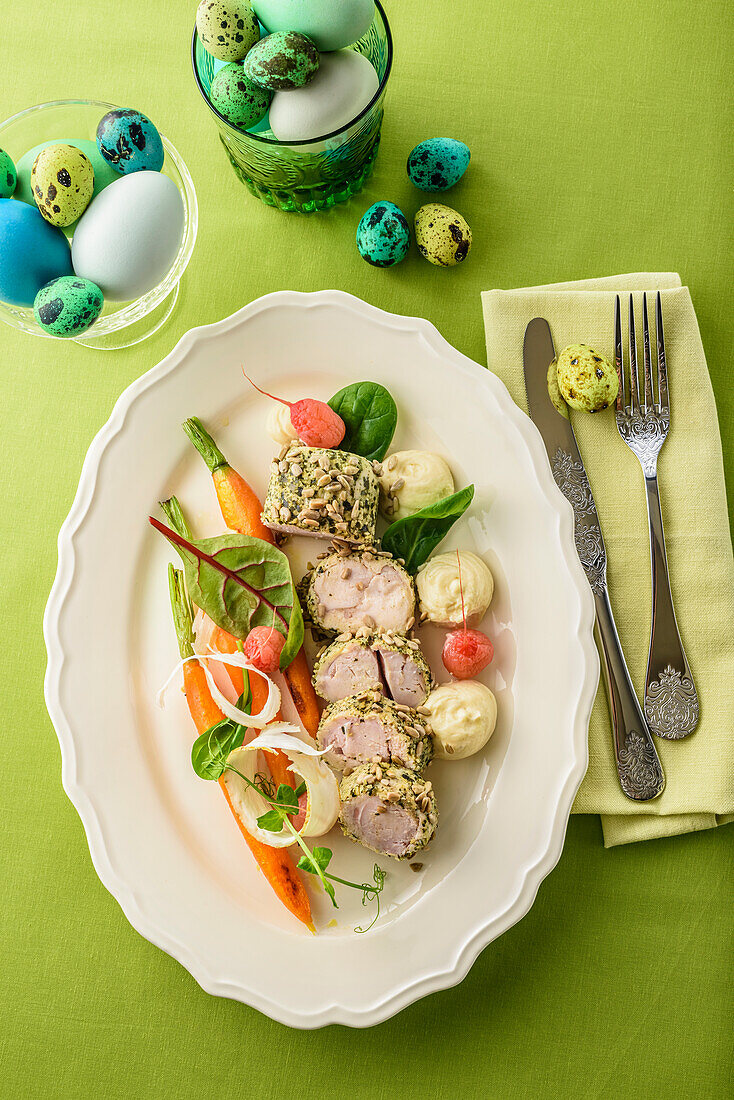 Saddle of rabbit roasted in pumpkin and sunflower seeds on horseradish cream and celery (Easter)