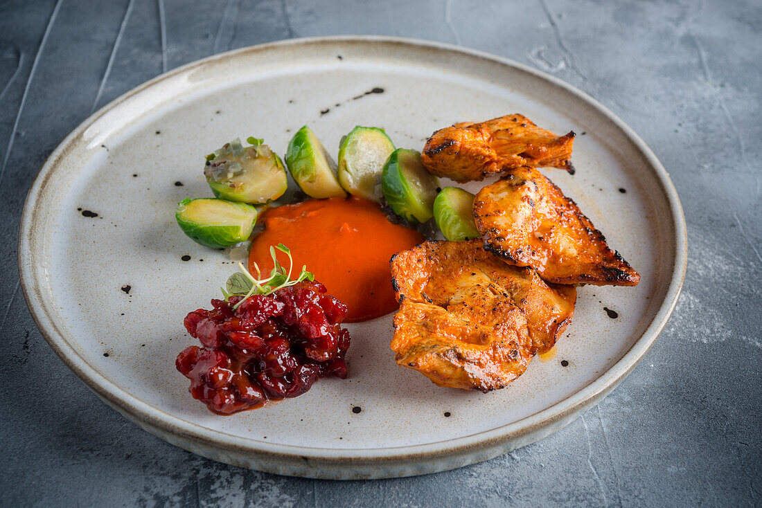 Tandoori turkey with Brussels sprouts, cranberry chutney, and tikka masala sauce