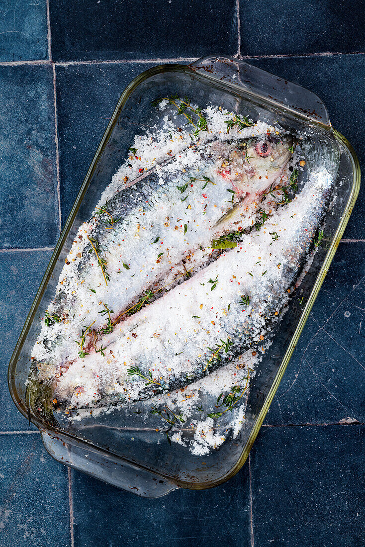 Prepare salted herring: Herring pickled in sea salt and spices