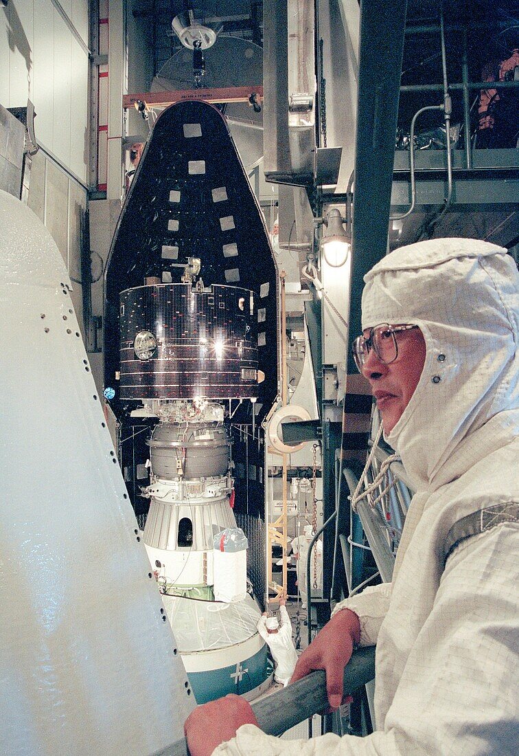 Technicians preparing Geotail spacecraft