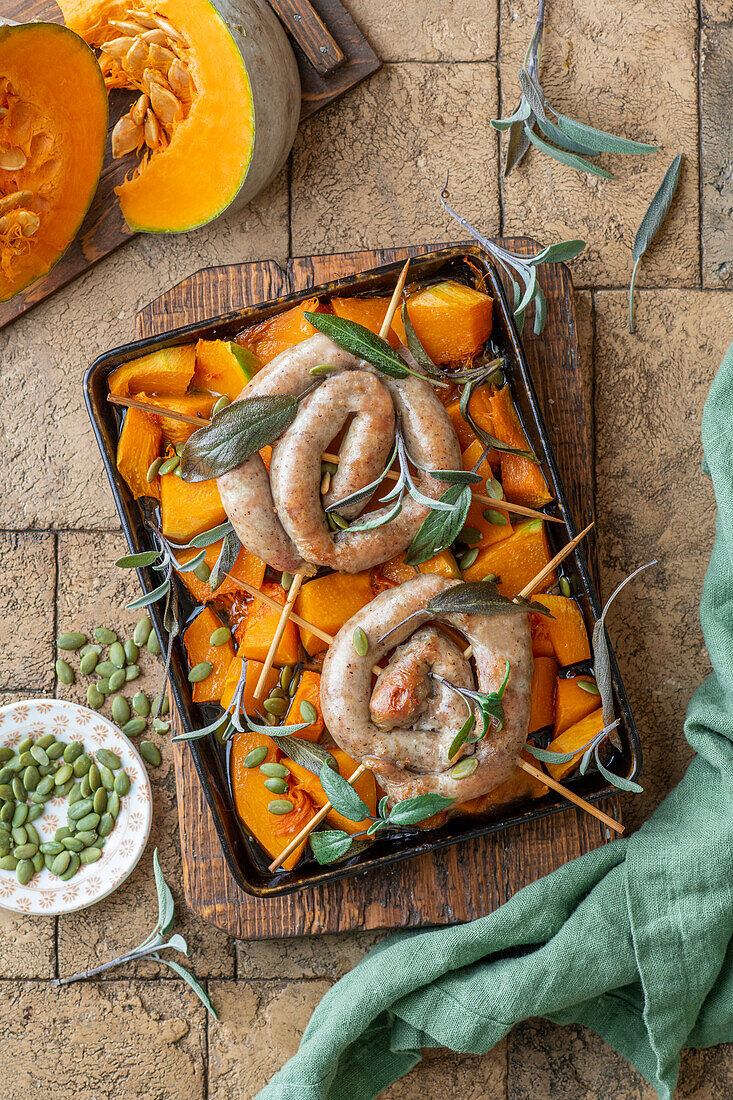Oven baked pumpkin with sausages