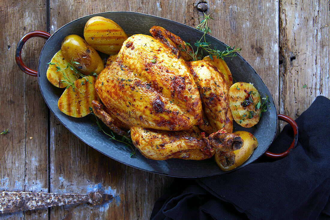 Whole chicken with grilled potatoes