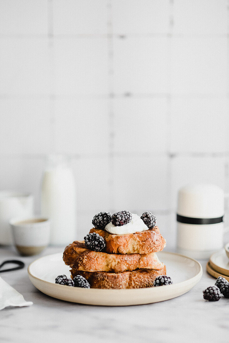 Challah toast with yogurt blackberries and maple syrup