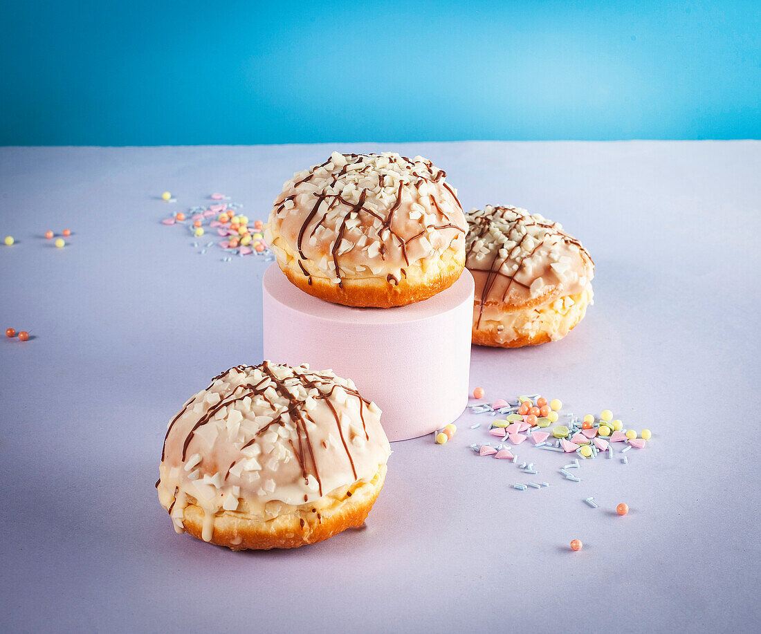 Donuts with icing and sprinkles