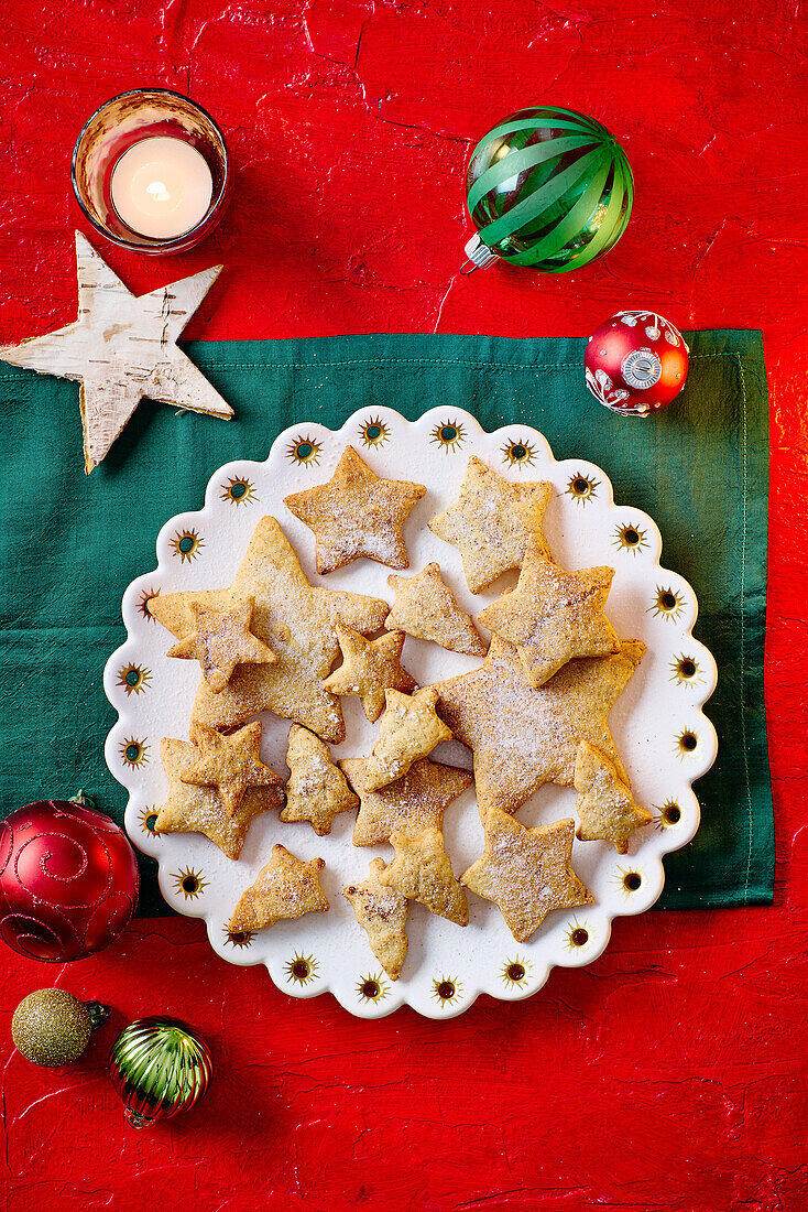 Christmas cookies in the shape of a star and a fir tree