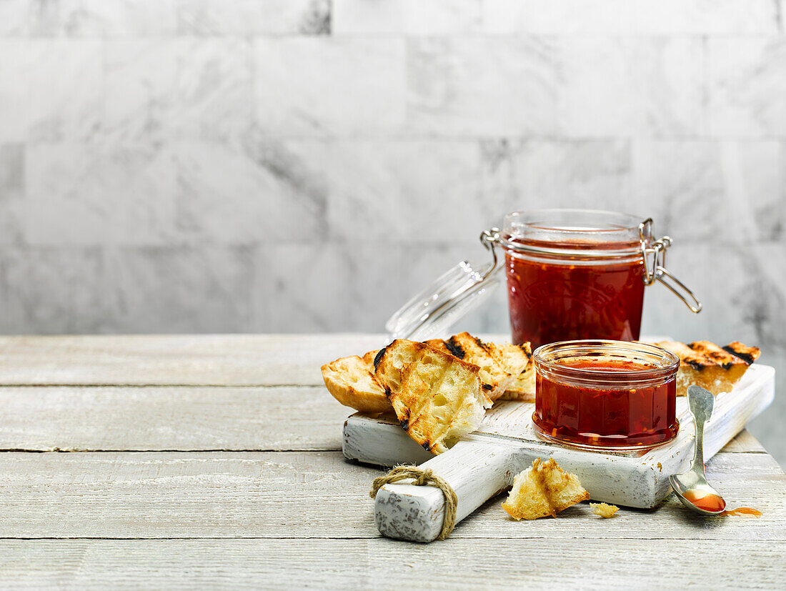 Toasted bread with chili dip