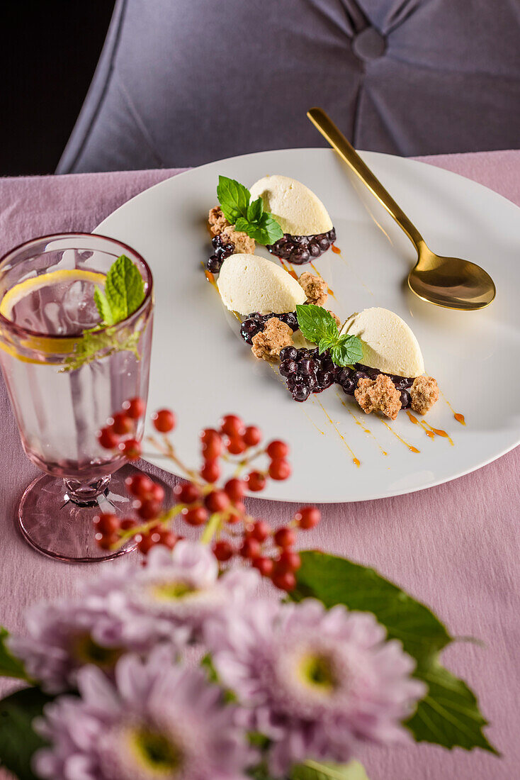 Deconstructed White chocolate parfait with blueberry jam, caramel and buckwheat cake