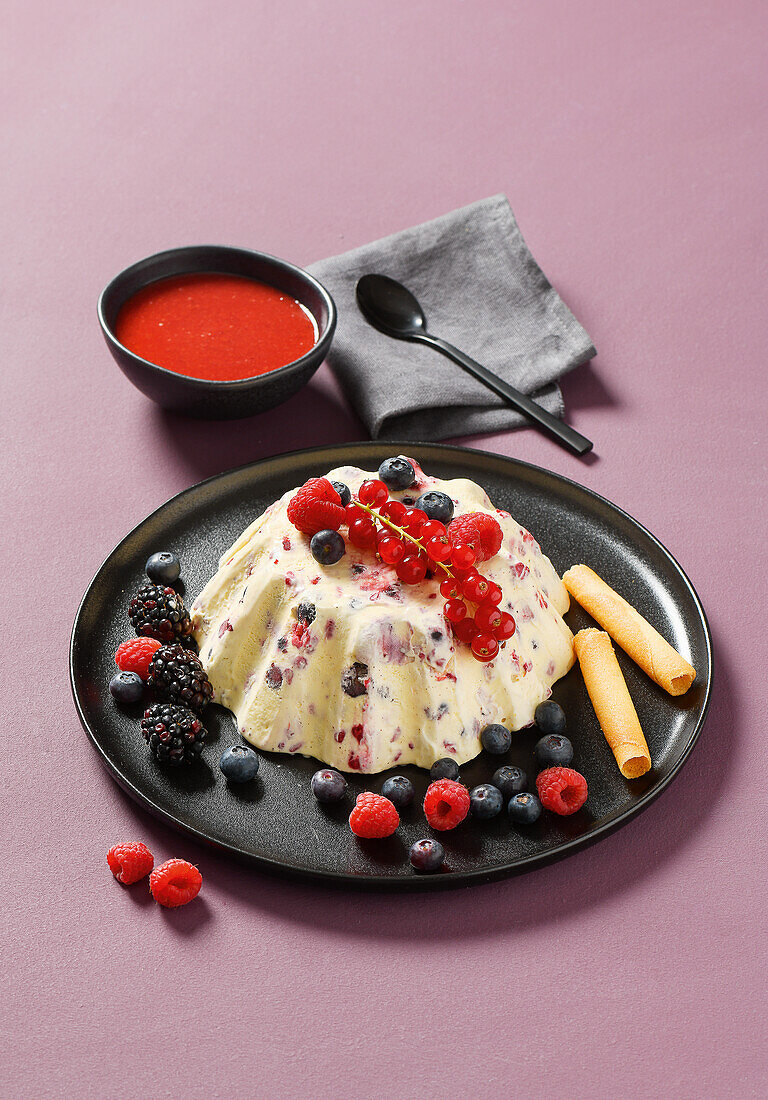 Molded berry custard dessert