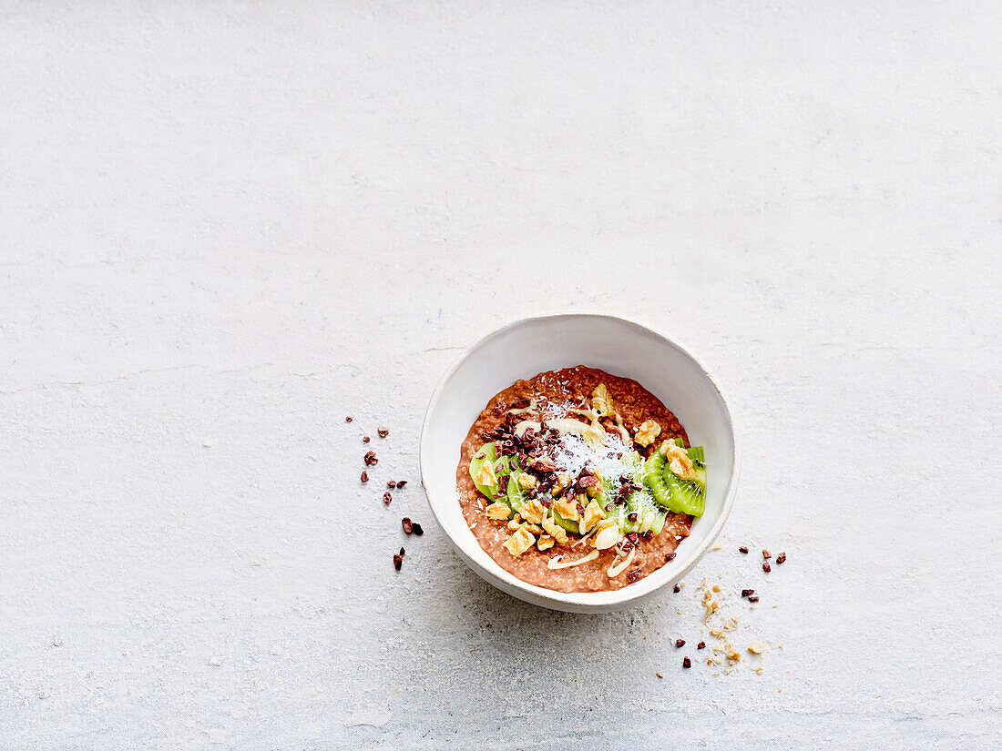 Chocolate Porridge with Walnuts and Kiwi