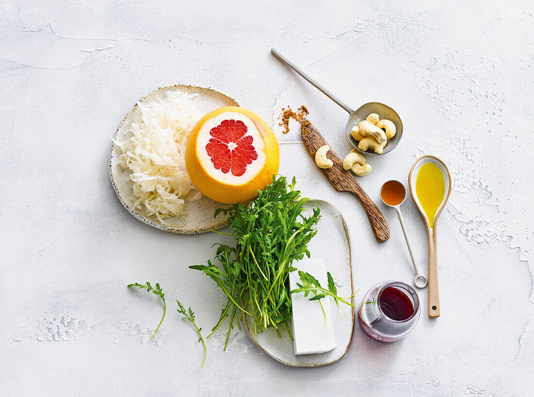 Ingredients for lacto-sauerkraut salad with grapefruit and feta
