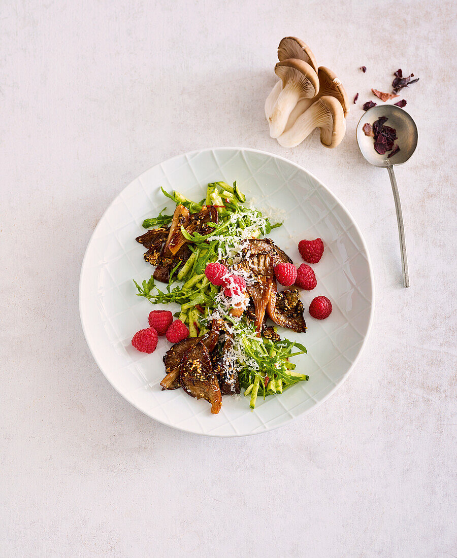 Zucchini salad with fried oyster mushrooms and raspberries