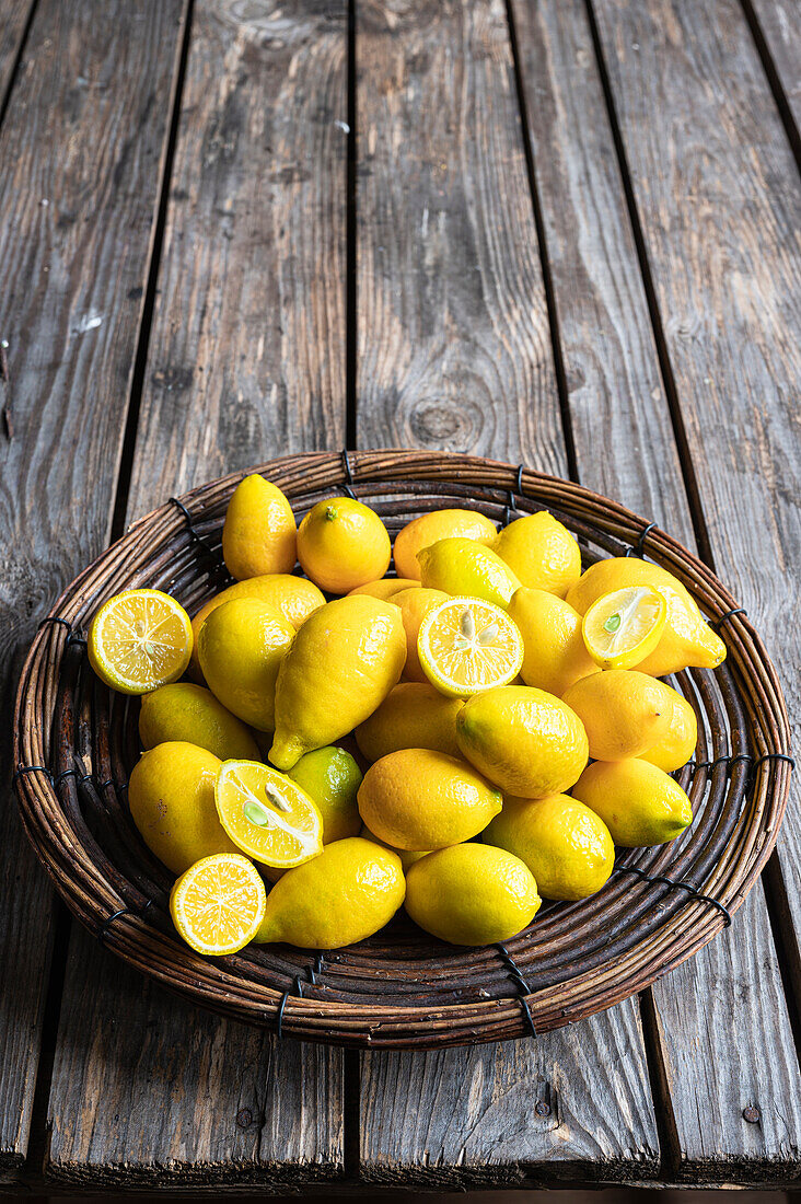 Mini lemons in a basket bowl