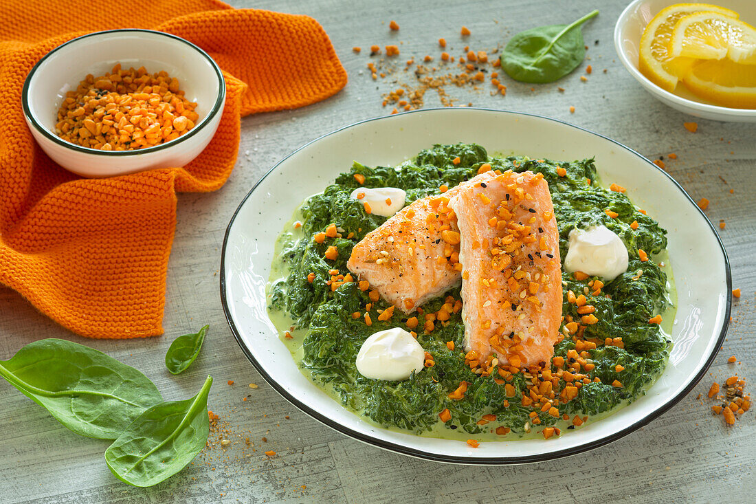 Salmon with dukkah spices on creamed spinach