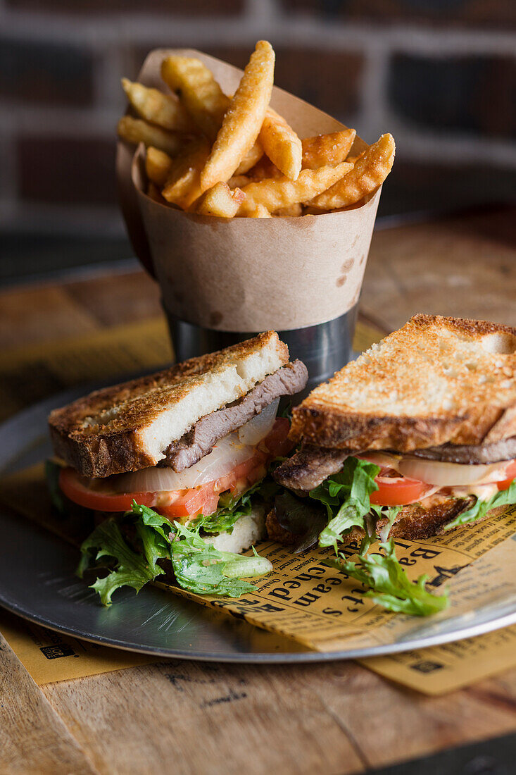 Steak sandwich with fries