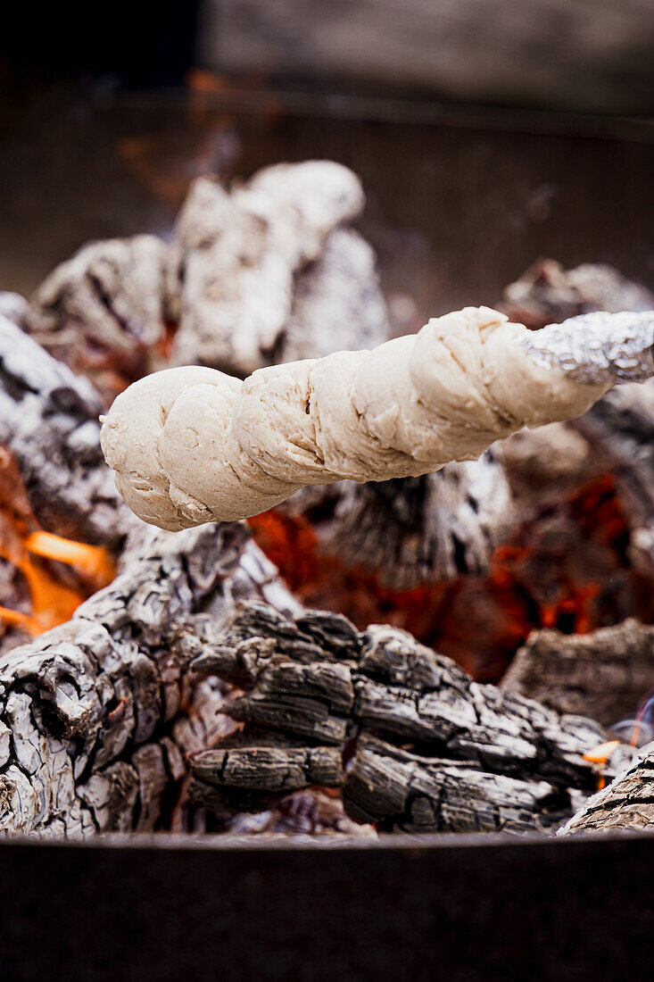 Campfire bread over a fire