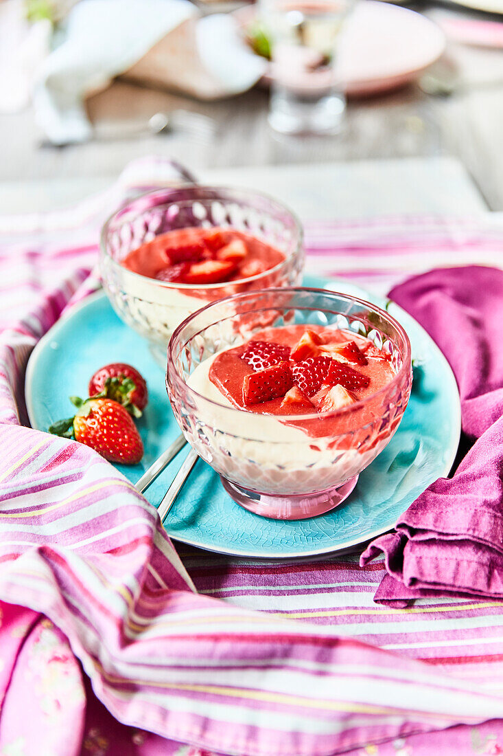 Curd cheese with strawberry sauce and fresh strawberries
