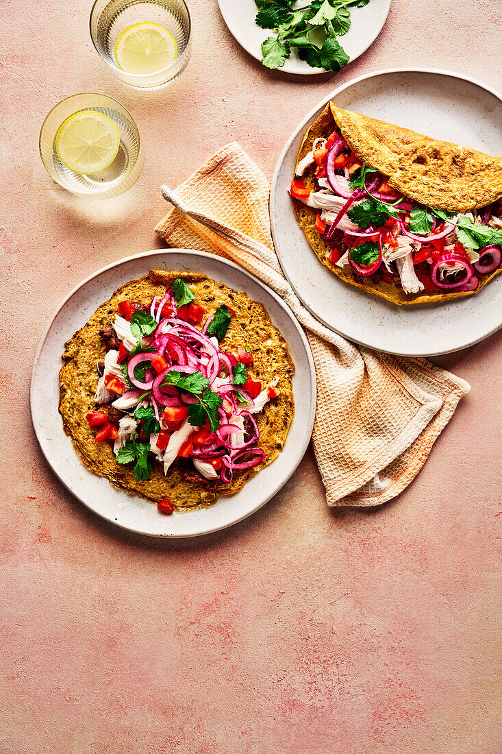 Mexican chicken wraps with black beans and tomatoes