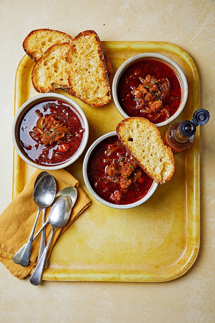 Caramelised onion and sausage soup