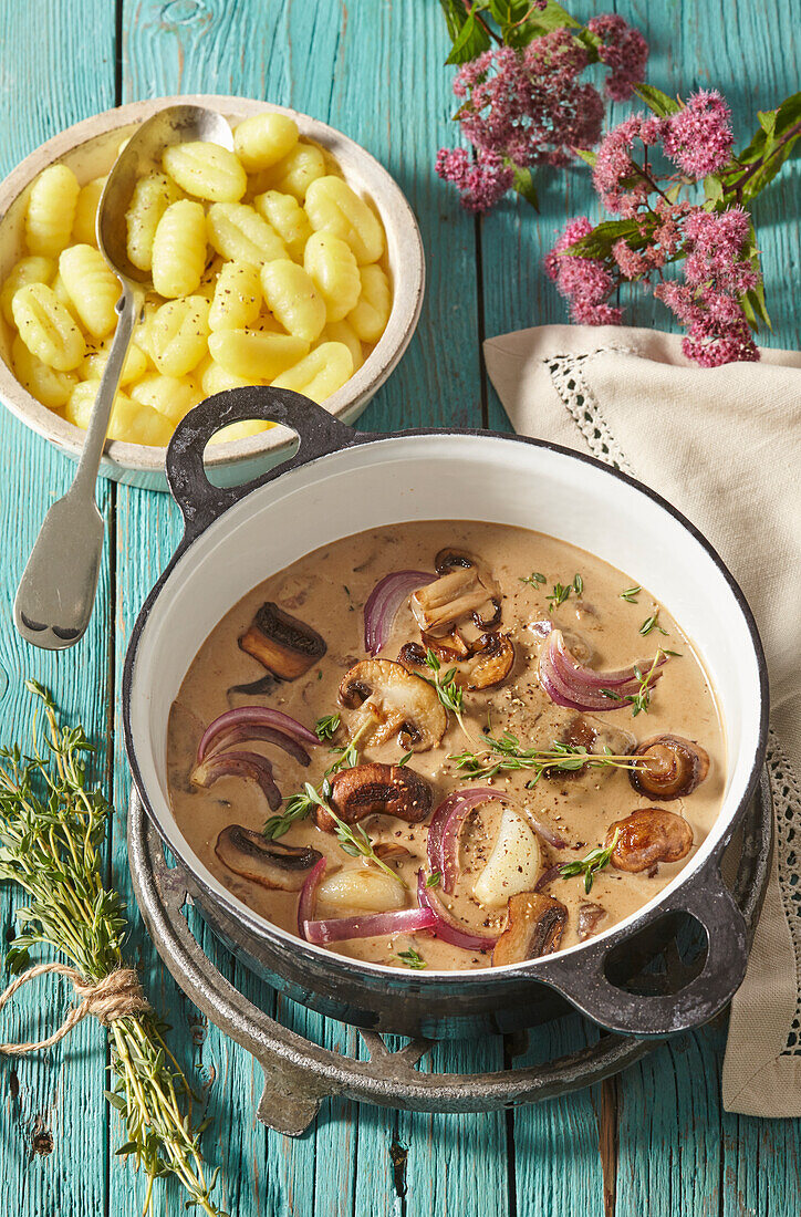 Creamy mushroom sauce with thyme and gnocchi