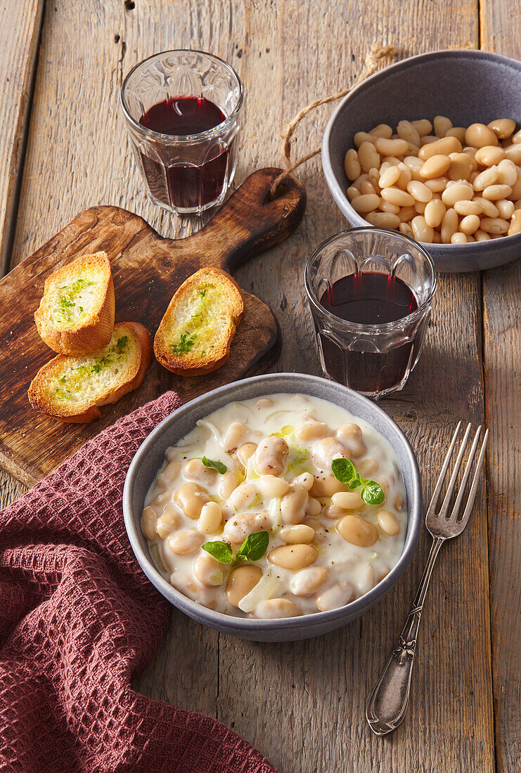 Creamy white beans with herb crostini