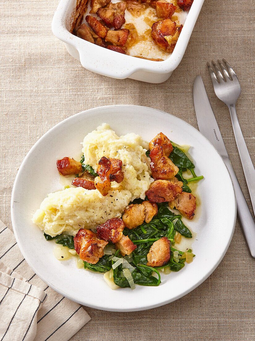 Roasted pork belly with spinach and mashed potatoes