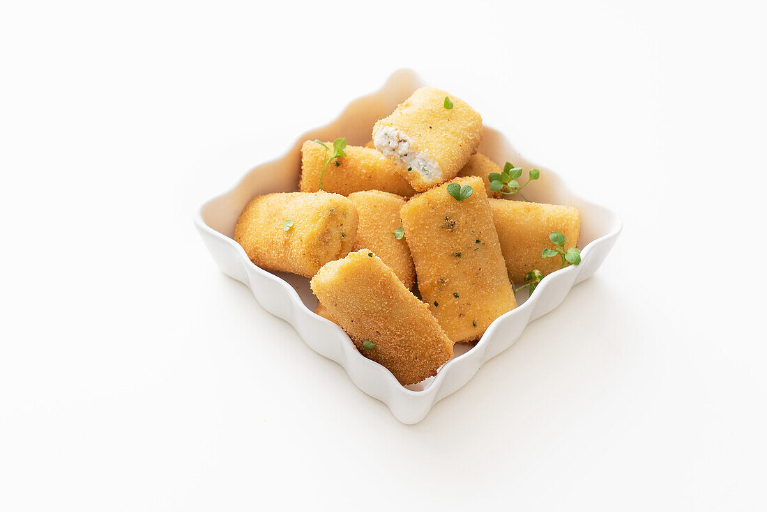 Breaded paccheri stuffed with ricotta, herbs and confit cherry tomatoes