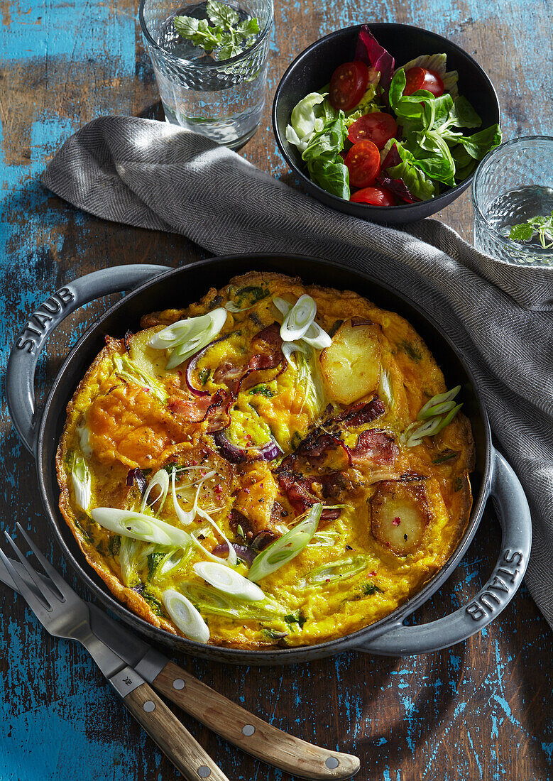 Baked frittata with bacon and spring onions