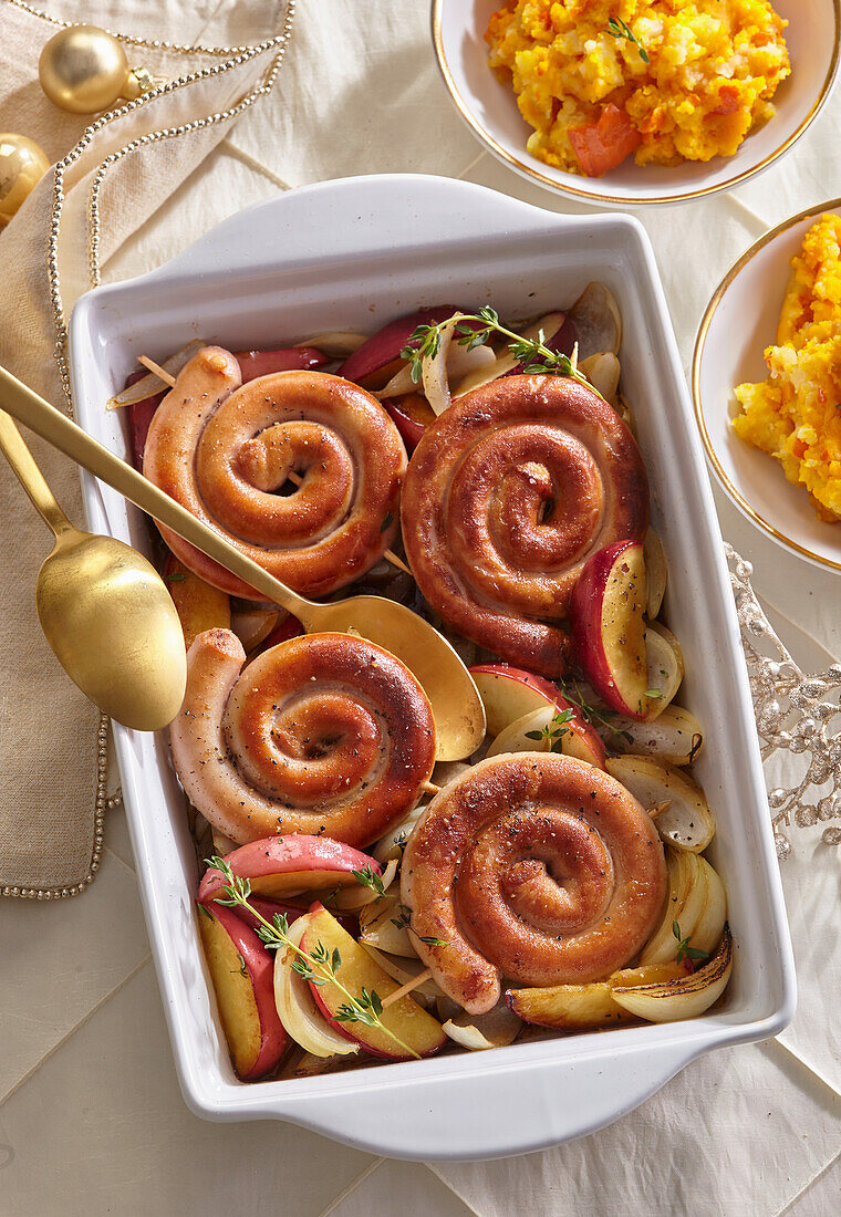 Baked sausage snails with apple and pumpkin puree