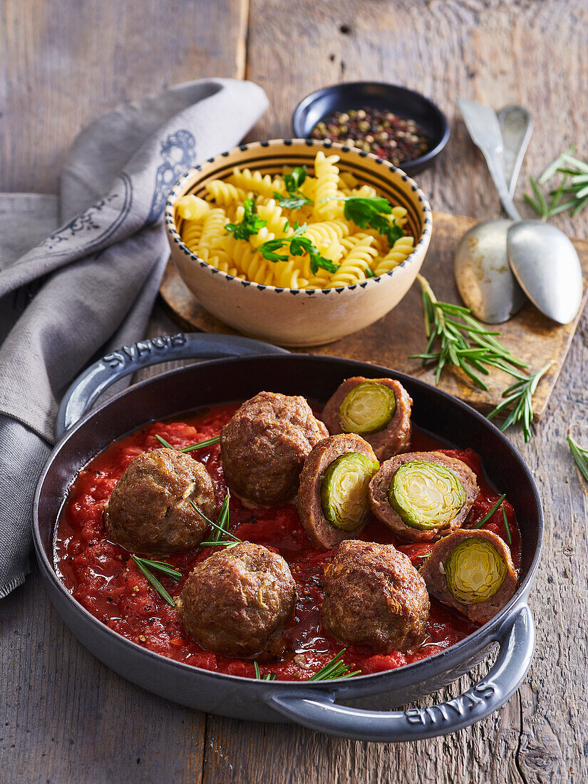Meatballs stuffed with Brussels sprouts and noodles