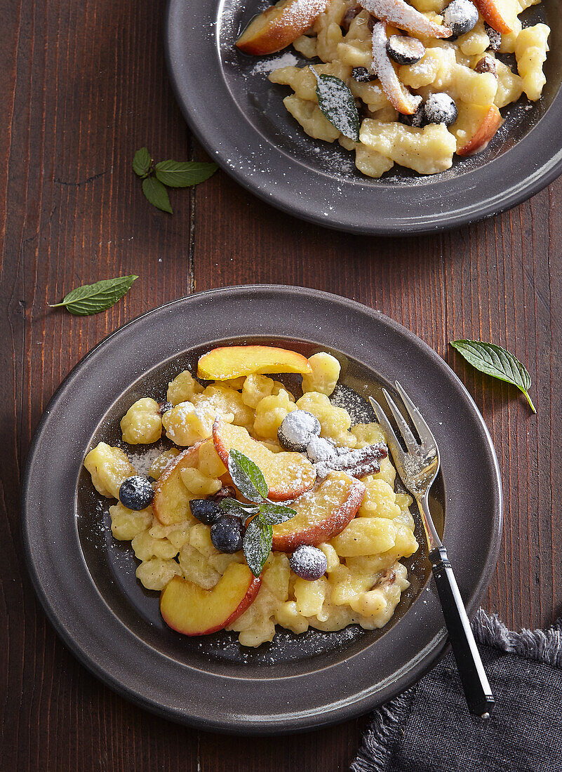 Sweet gnocchi with apples, blueberries, and mint