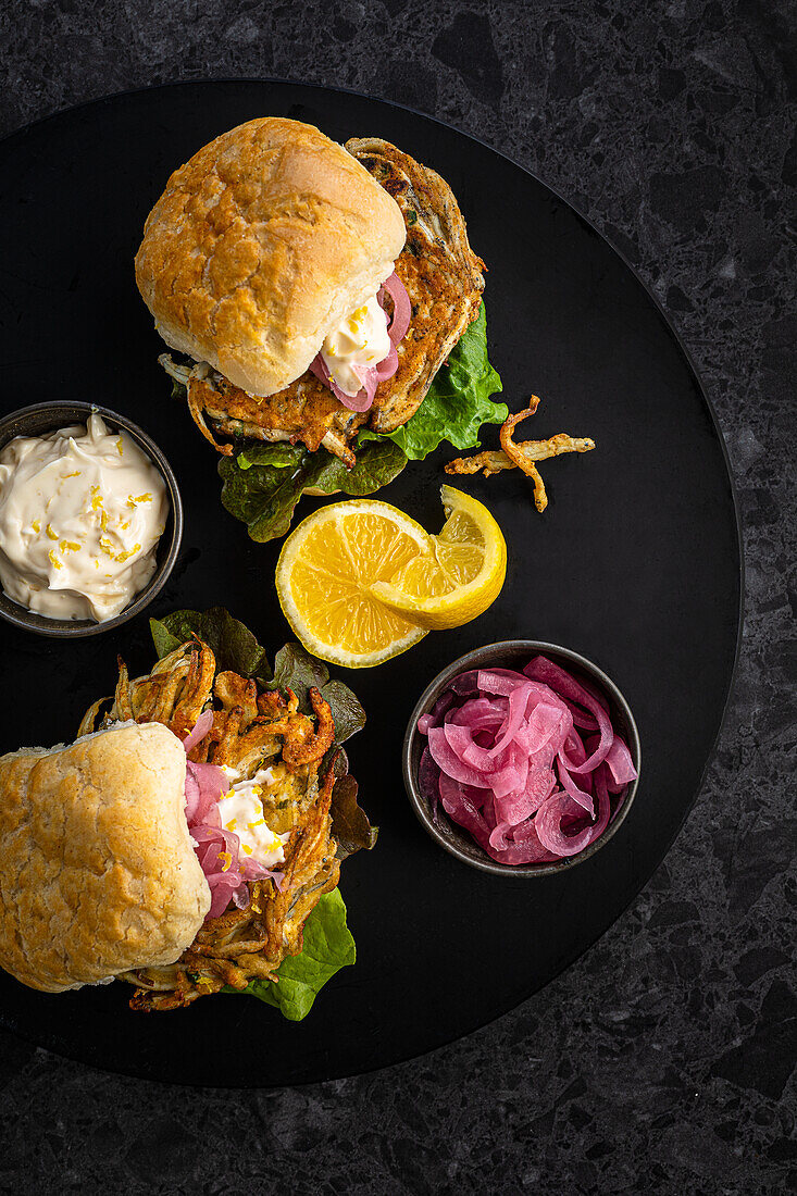 Burgers with fritters made from New Zealand young fish
